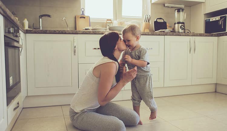 Photo of mom and toddler in kitchen